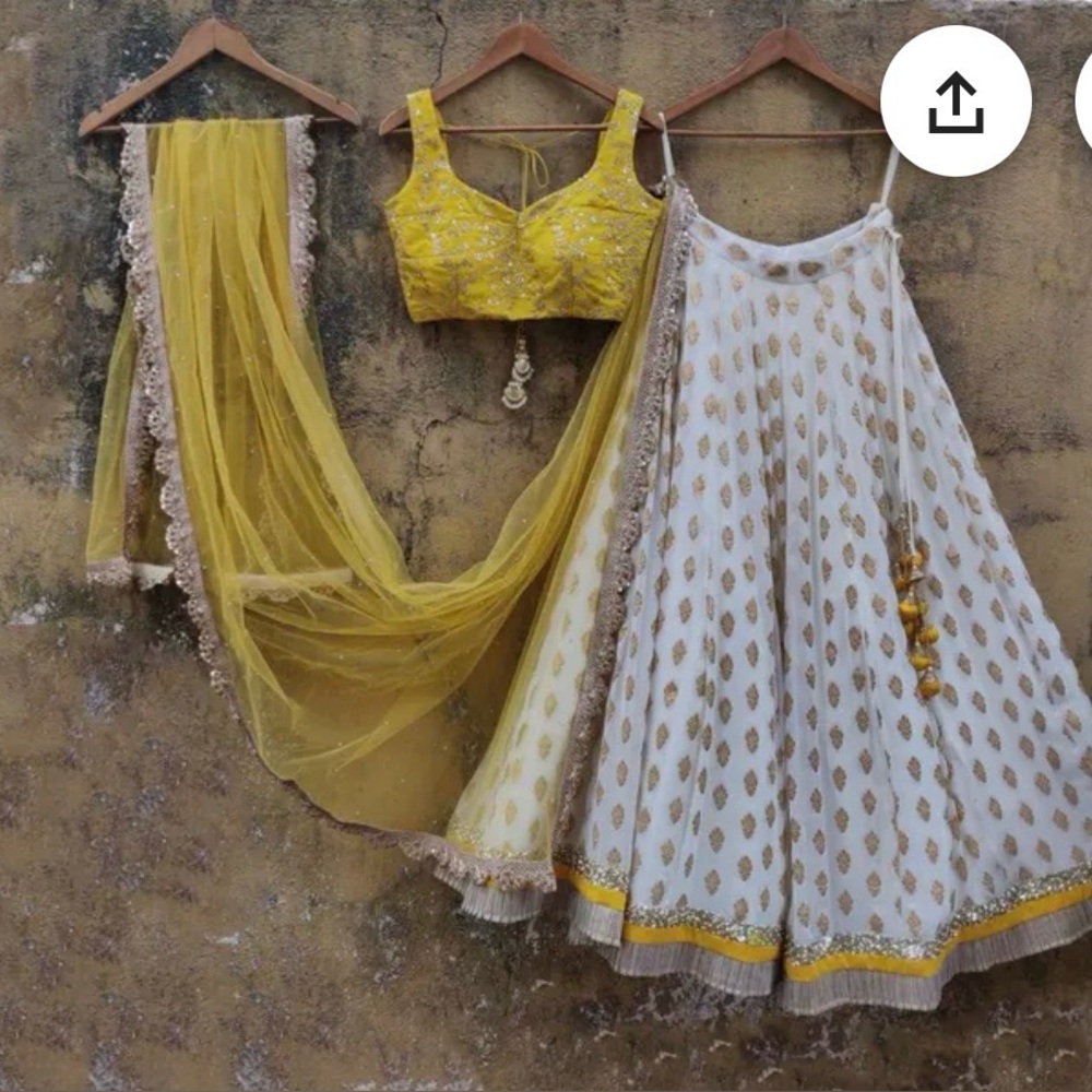 Yellow Embroidered Lehenga Set with White Gold Motifs